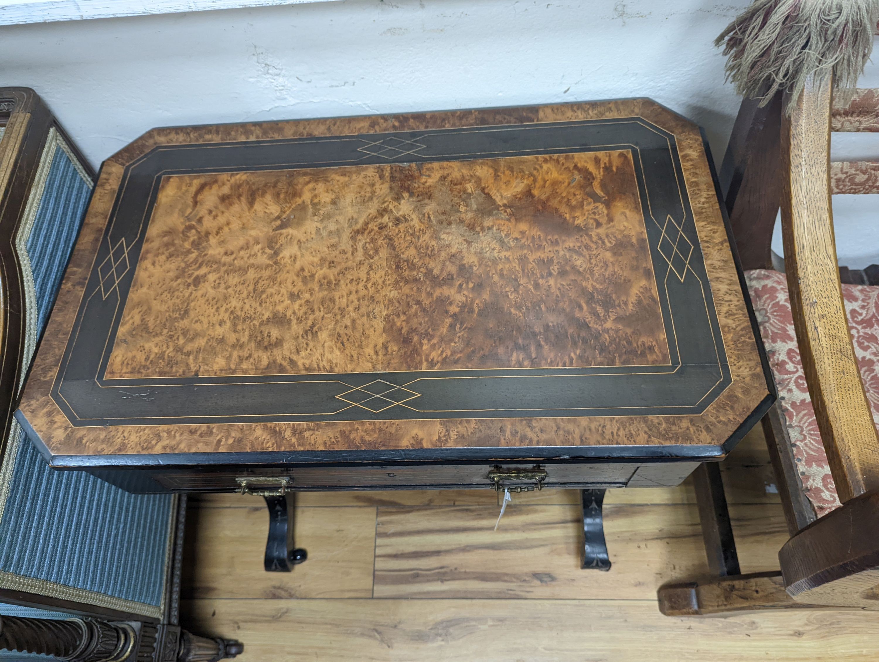 A late Victorian part ebonised bird's eye maple writing/work table, width 67cm, depth 41cm, height 69cm